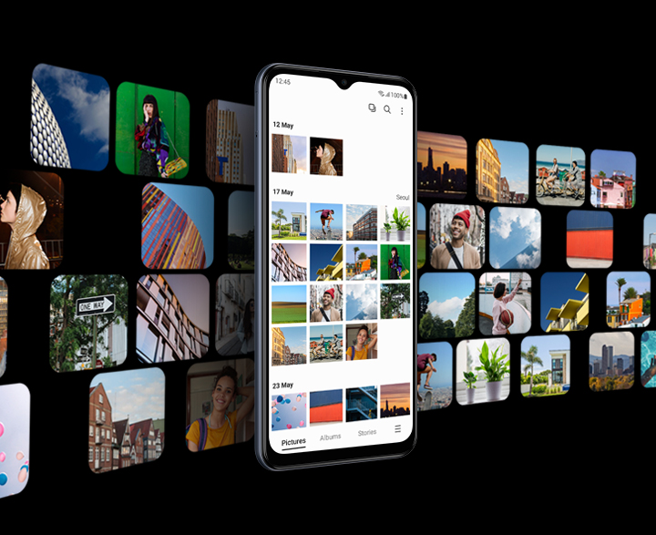 Galaxy M33 5G with the Gallery app onscreen is in the center. Numerous images are spread out in the background, representing that users can store their images and videos in Galaxy M33's spacious storage.