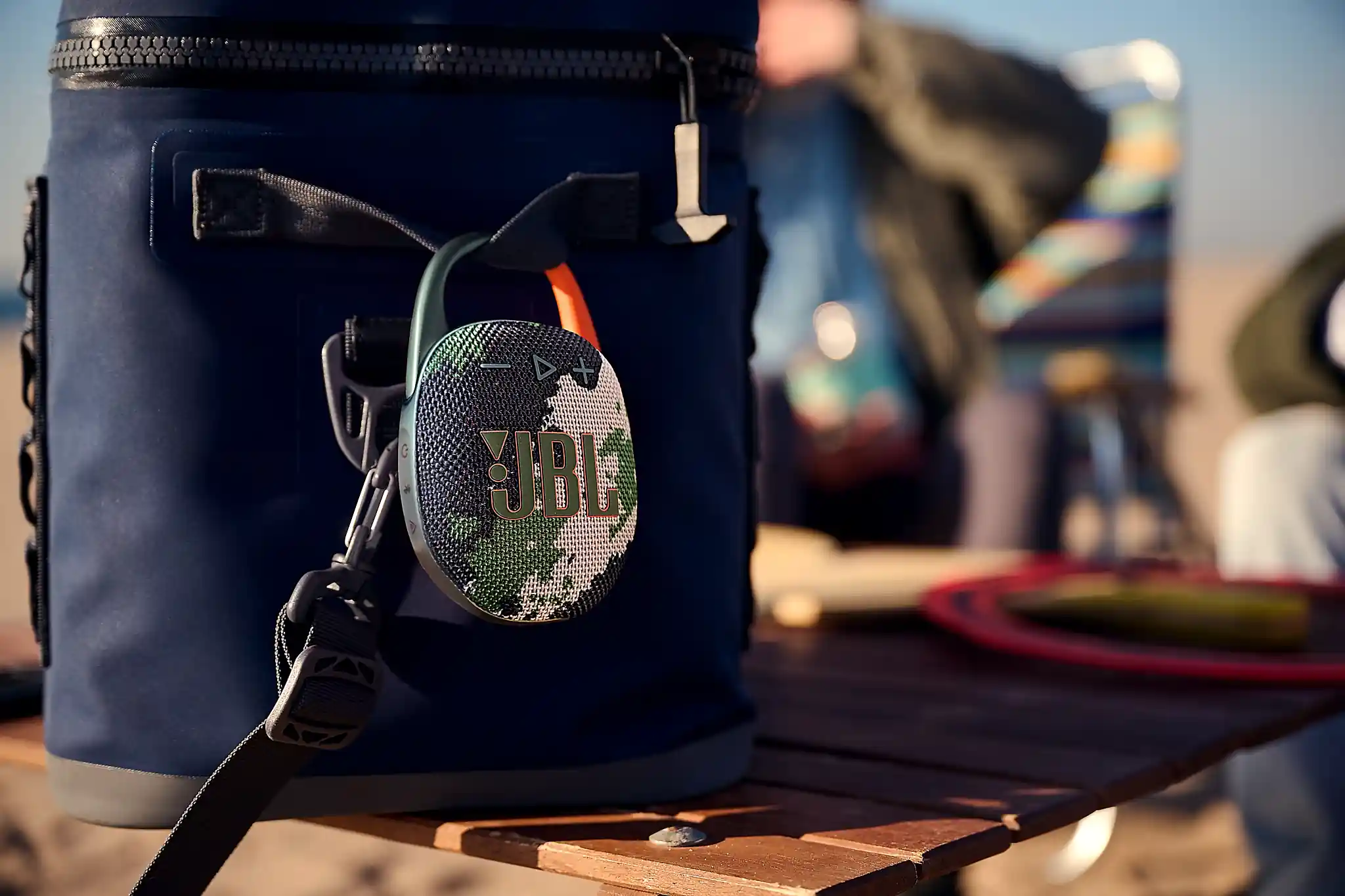 JBL Portable app on smartphone showing EQ settings and customisation for JBL Clip 5