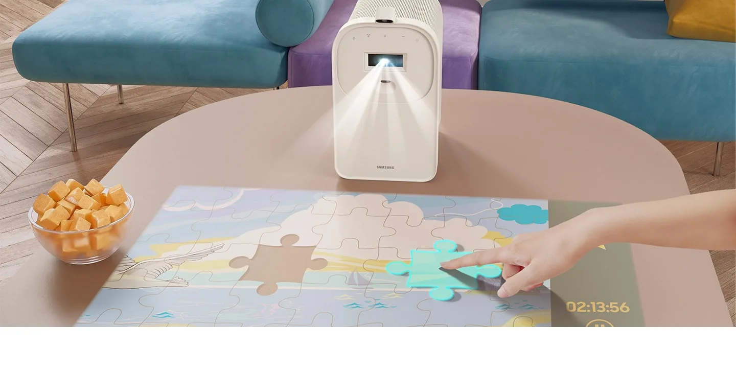 Samsung The Premiere 5 LPF5D projecting an interactive touchscreen onto a table with Touch Stand