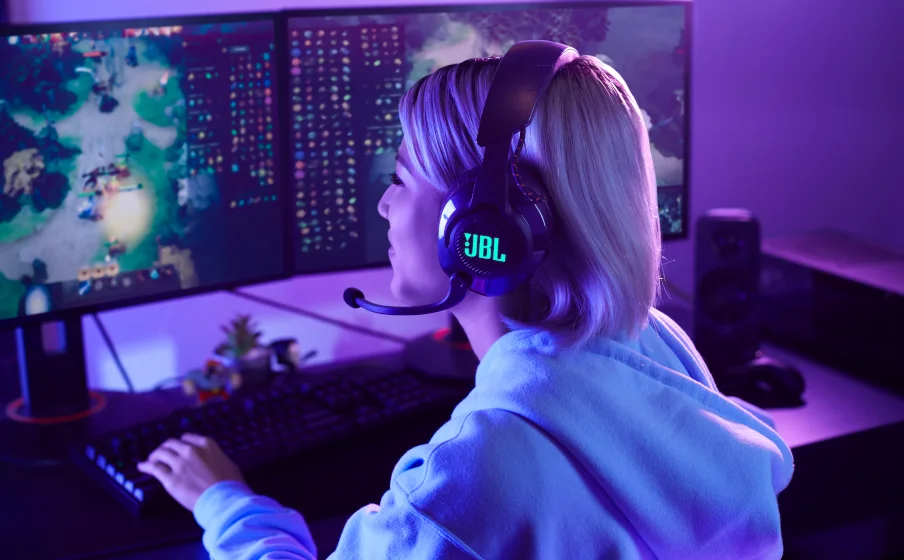 JBL Quantum 610 Wireless headset used for immersive gaming with JBL QuantumSURROUND and DTS