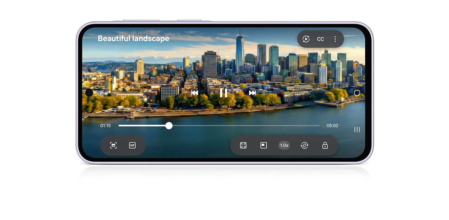 A video playing on a Galaxy A37 5G in landscape mode with text 'Beautiful landscape' onscreen. The video shows a wide view of a city by a river, gradually zooming into its dense buildings.