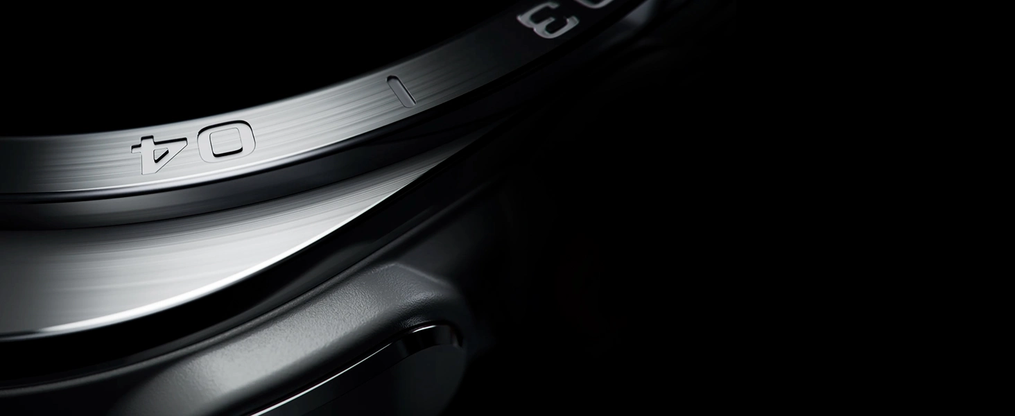 Close-up view of a Galaxy Watch Ultra2 in Titanium Silver showing its exterior design in detail, including Cushion design, refined bezel, sculpted edge and side buttons.