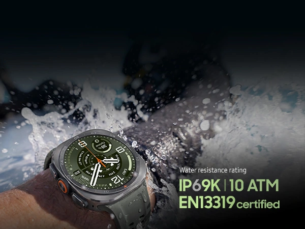A person wearing a Galaxy Watch Ultra2 in Titanium Silver with a Marine Band in Olive with waves splashing against their wrist to demonstrate Galaxy Watch Ultra2 is ideal for open-water activities.