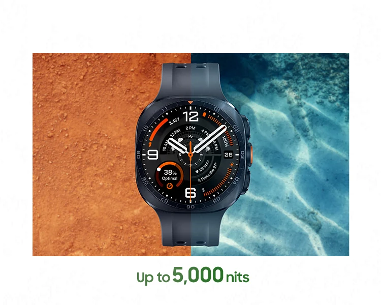 Galaxy Watch Ultra2 in Titanium Silver with an Olive Marine Band, shown facing upward outdoors in direct sunlight. A background divided between sandy terrain and sunlit water emphasizes the high visibility of the 5,000-nit display across different environments.