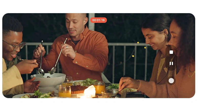 A video of a group of people enjoying dinner outdoors in the evening can be seen. Even in low light, ProVisual Engine helps keep the scene bright and details clear.