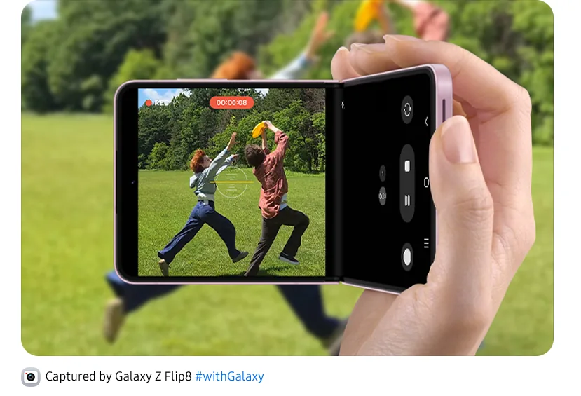 Galaxy Z Flip8 is being held like a camcorder to shoot two friends having fun and running outdoors. Super Steady's Horizontal Lock feature keeps the footage level.