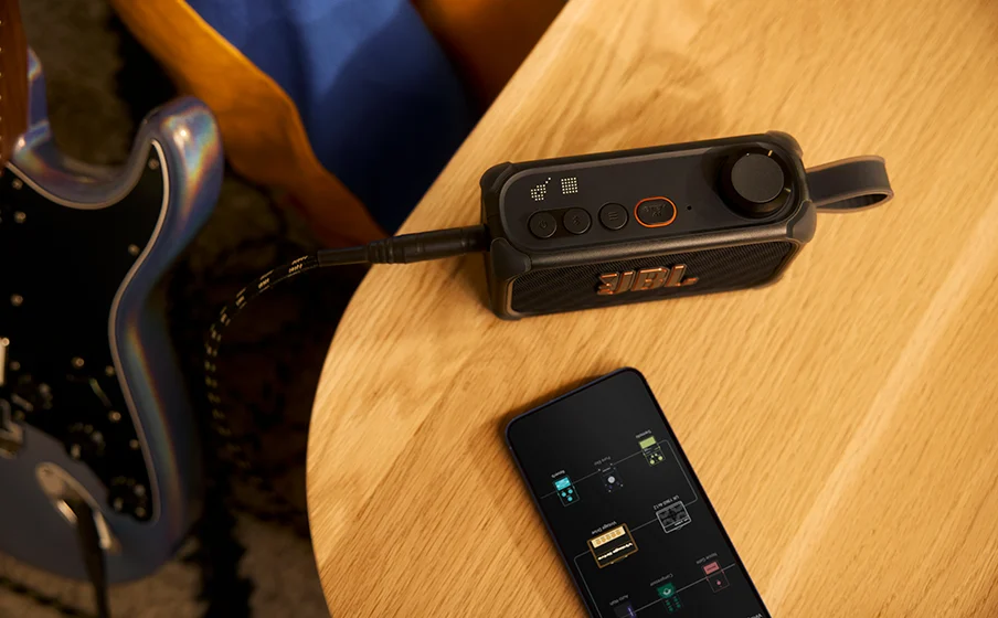 Guitarist shaping amp models and effects with JBL BandBox Solo